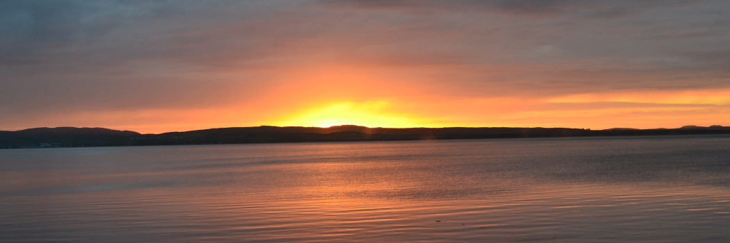 Sunset across Loch Indaal from the living room